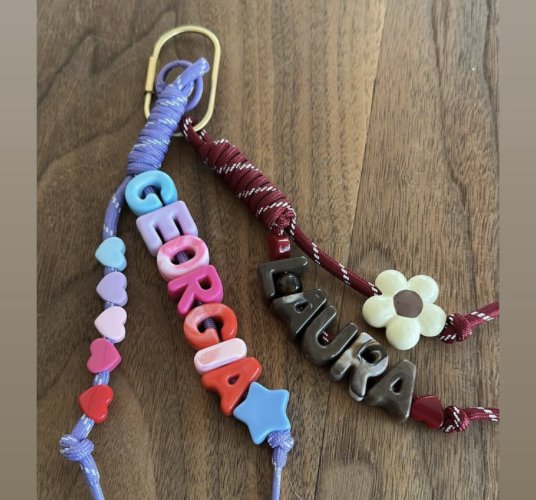 Keychains spelling Georgia and Laura on a gold clip