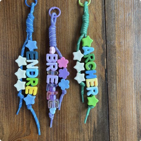 Keychains spelling Endre, Bree and Archer